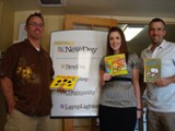 Phoenix New Day Family Center - Steve Heintz and George Snyder with Jessica Gardner, a volunteer at the Phoenix New Day family center